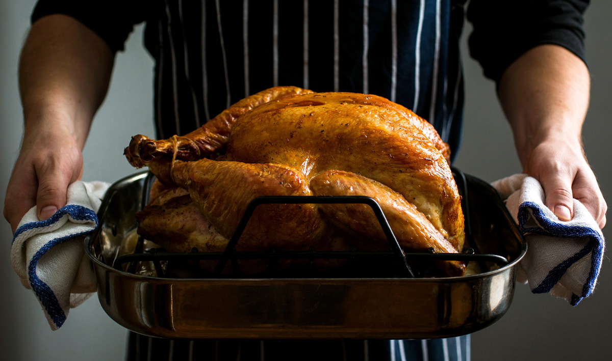 Want to save at least $20 on Thanksgiving dinner this year? If you got your turkey for free, you could! Some grocery stores let you have a free turkey, but you need to know how to do it. Here are all the details to help you save!