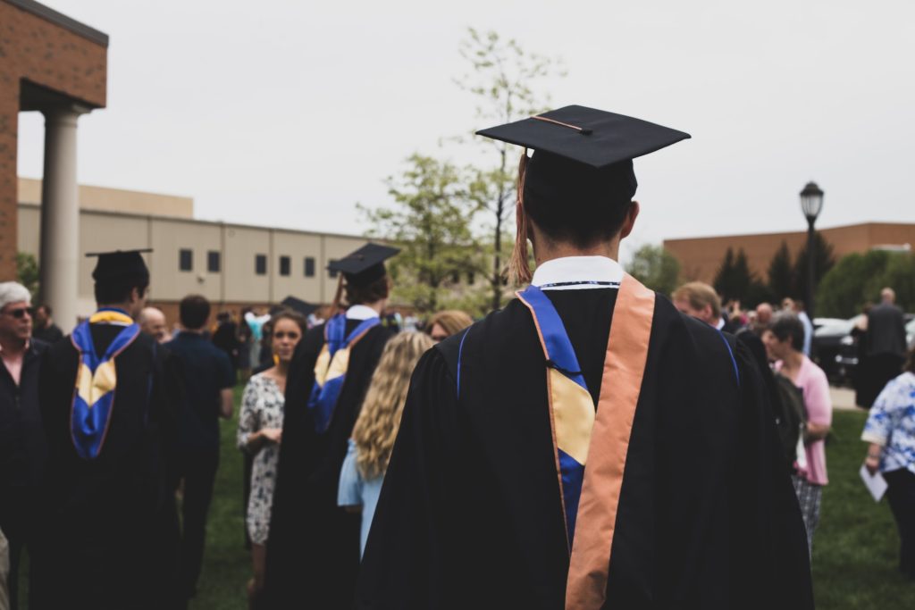 University graduates celebrating with loved ones