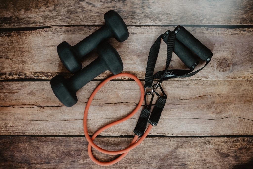 Weights and a skipping rope for home gym