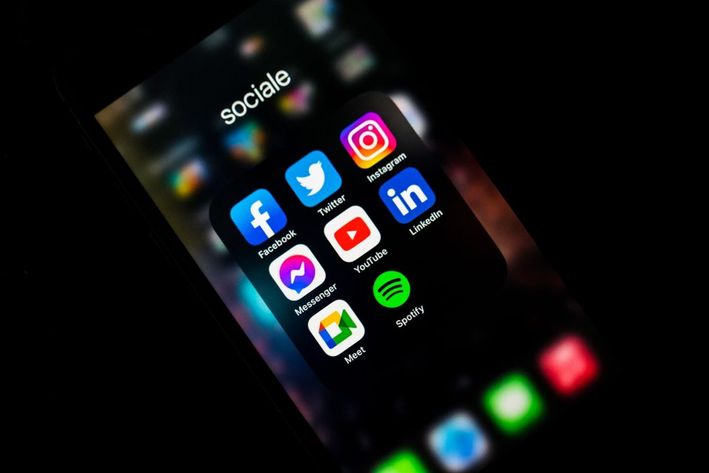 A phone screen with social media icons