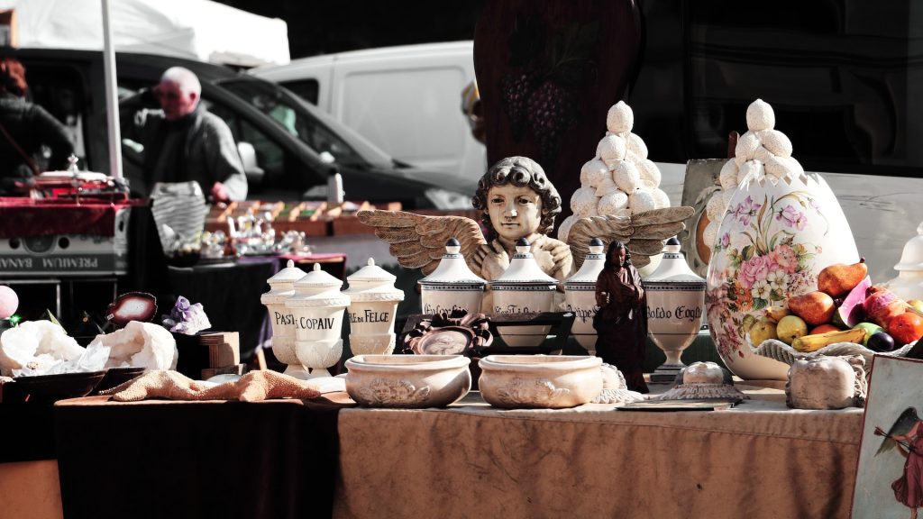 art works on display in a garage sale