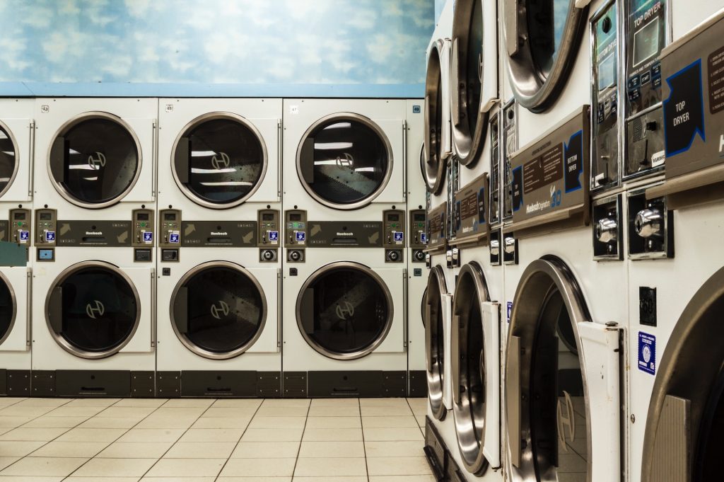 A collection of laundry machines