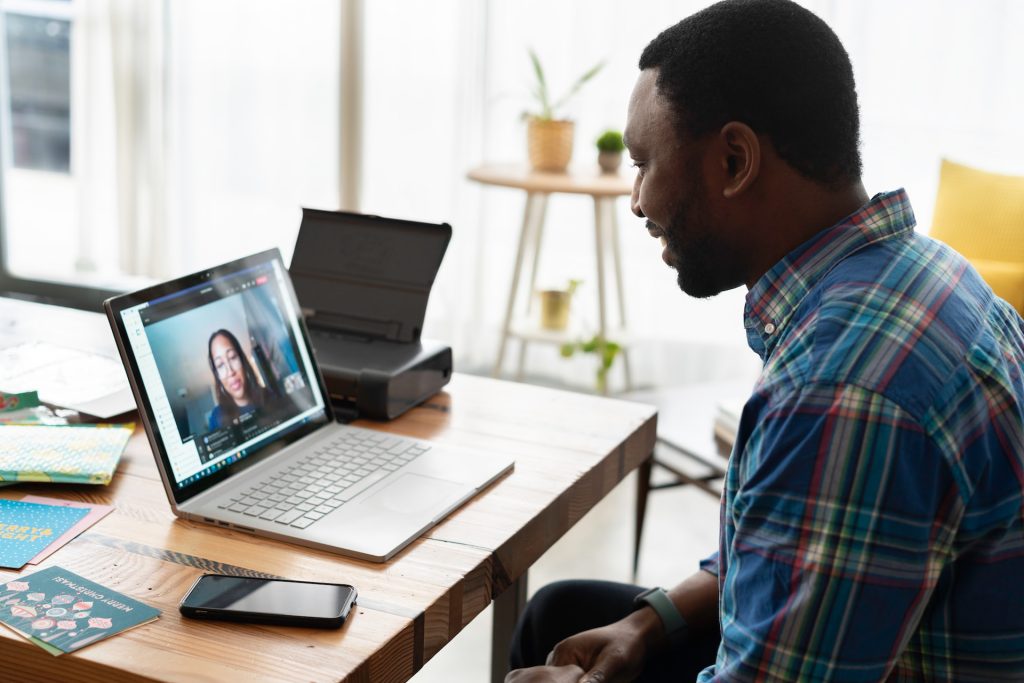 Two people in a virtual meeting
