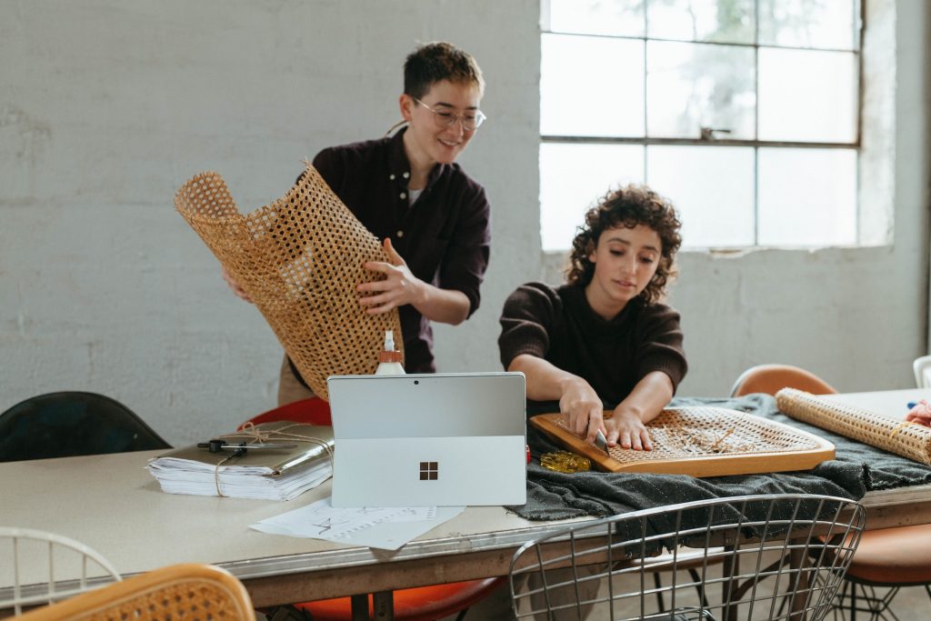 Two teens working on a weekend