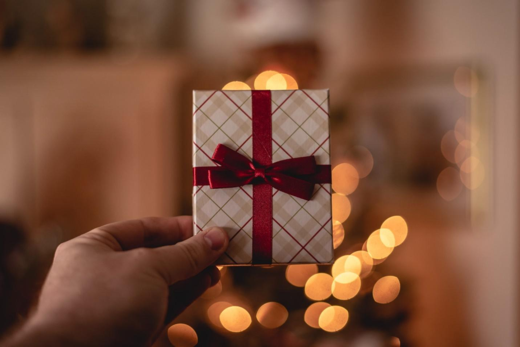 A person holding a gift