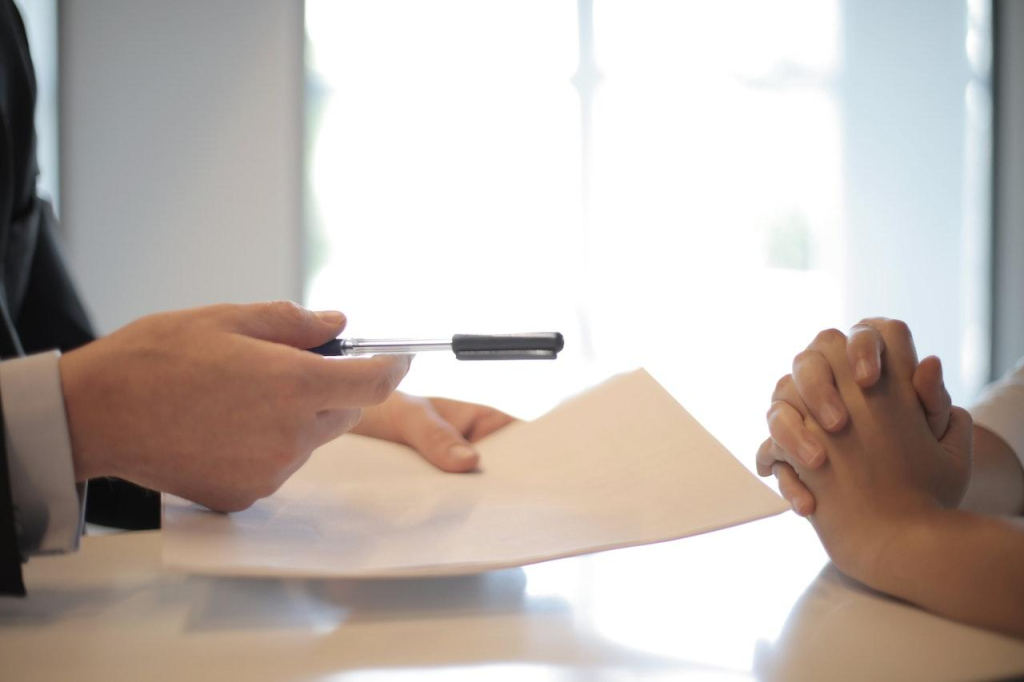 A football agent engaging a client