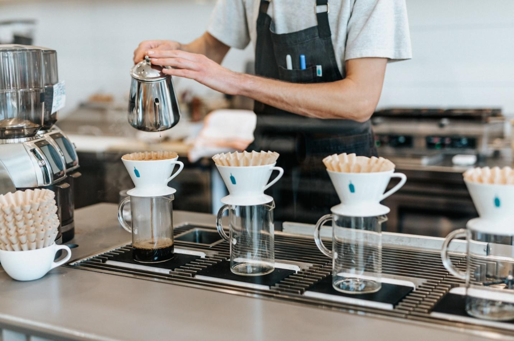 A person making coffee
