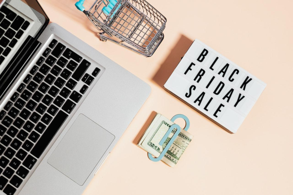 A black friday sales signage near a laptop