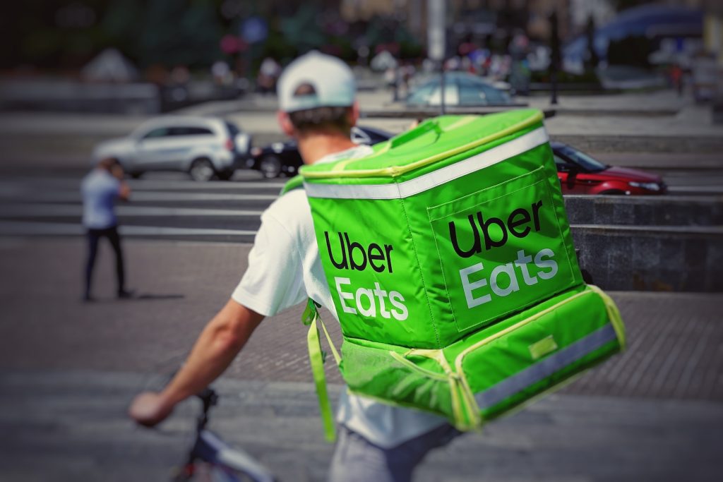 An Uber Delivery Guy on a Bike