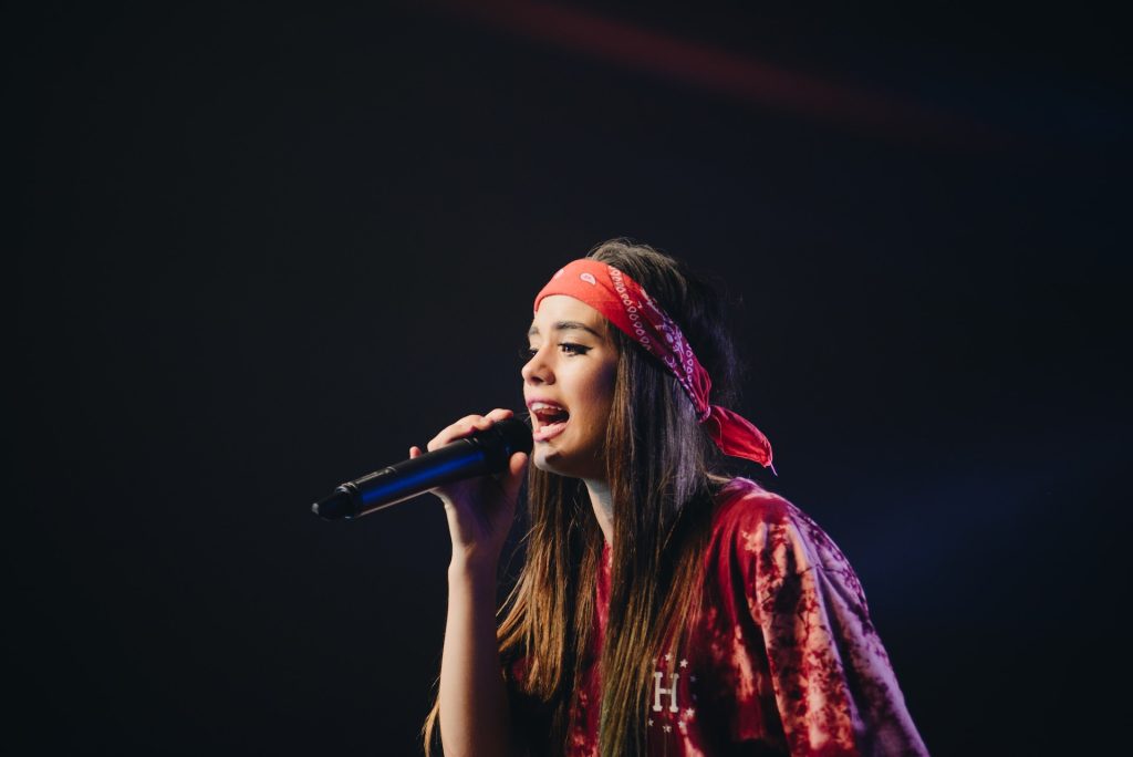 A young lady singing