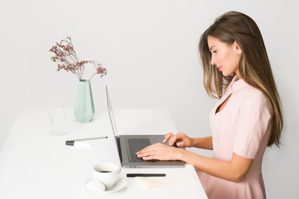 A woman working on a laptop