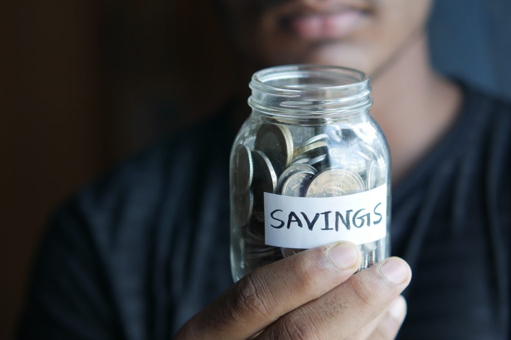 A person holding savings